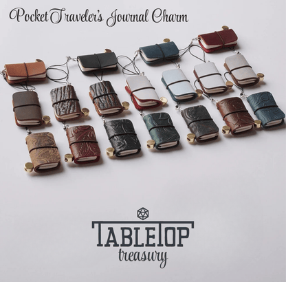 Collection of small leather journals on strings with 'Tabletop Treasury' branding.
